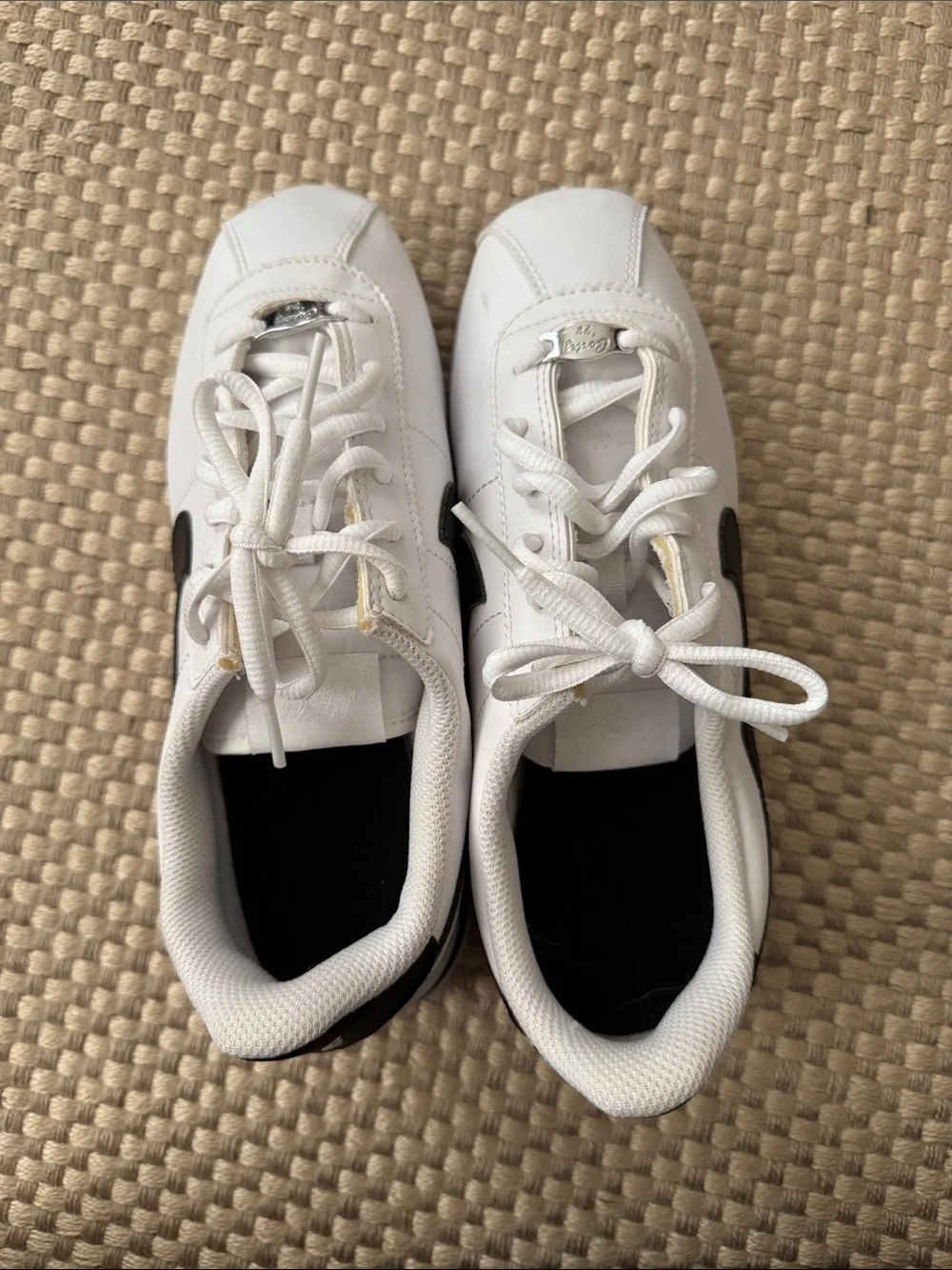 Nike Kids White Sneakers with Black Swoosh